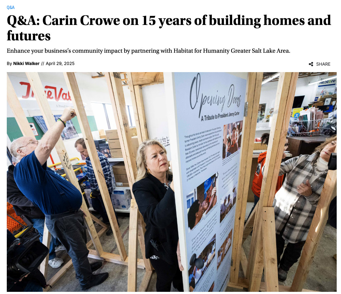 Carin Crowe signs the doorway of a Jimmy Carter tribute display