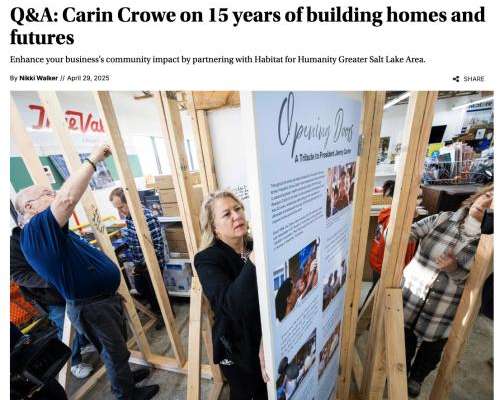 Carin Crowe signs the doorway of a Jimmy Carter tribute display